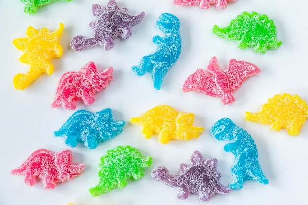 Dinosaurs jelly bonn candies on the white background