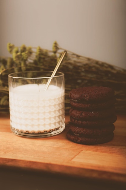 Dipping delicious cookies in a glass of milk