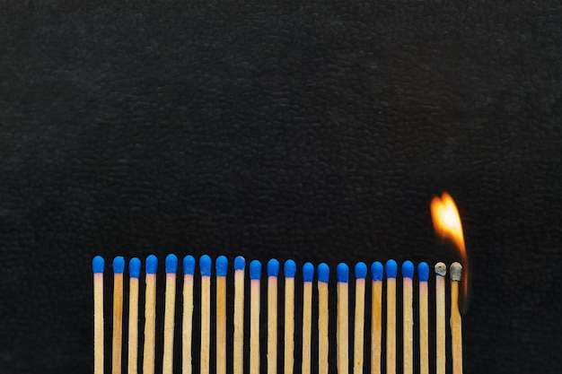 Photo directly above shot of burning matchsticks on table