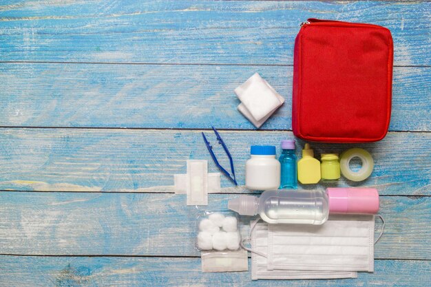 Photo directly above shot of medical supplies on wooden table