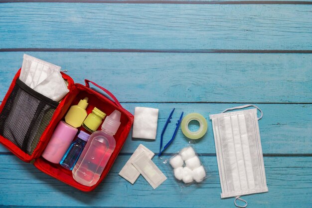 Directly above shot of medical supplies on wooden table