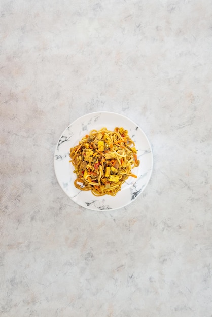 Photo directly above shot of pasta served in plate on table