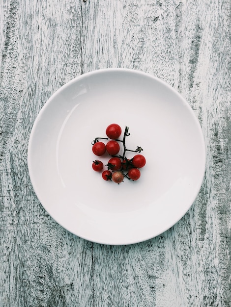 Photo directly above shot of red currant in plate