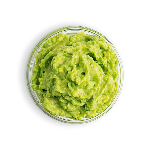 Directly above view of mexican guacamole dipping sauce made of pureed avocado served in bowl