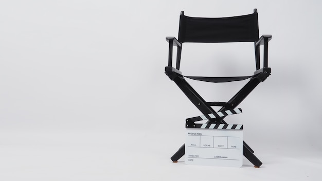 Director chair and Clapper board or movie slate on white background.