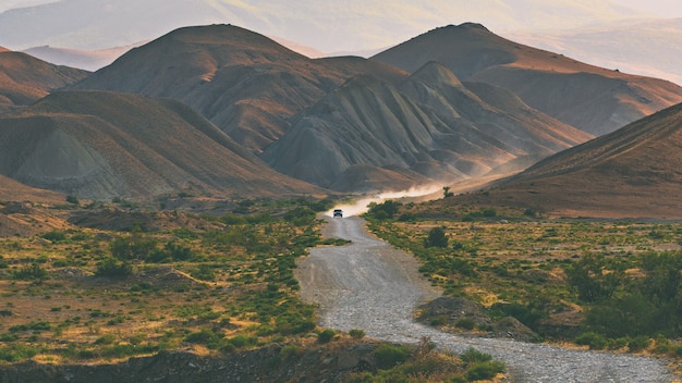 Dirt road leading to the mountains