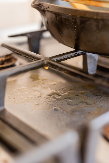 Dirty gas stove in the kitchen house cleaning