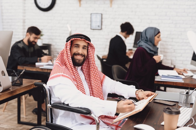 Disabled Arab Office Worker in Keffiyeh Smiling