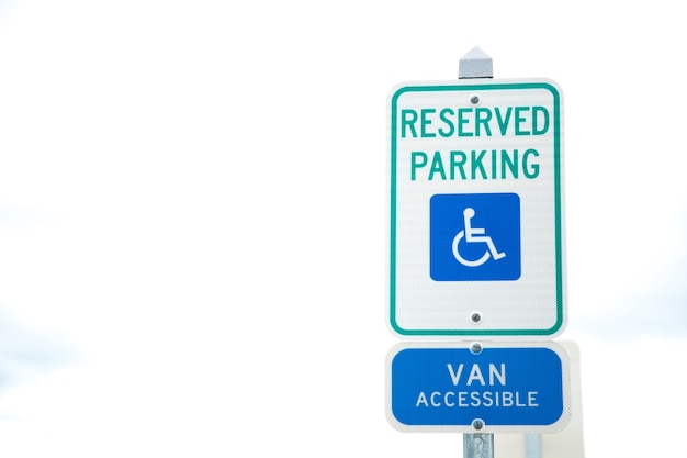 Disabled parking space and wheelchair way sign and van accessible sign in boston.