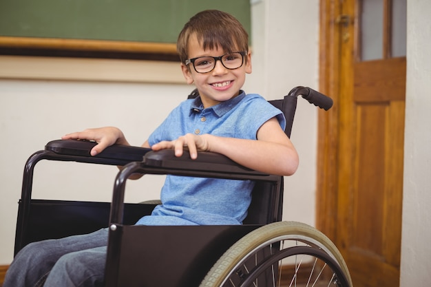 Disabled pupil smiling at camera 