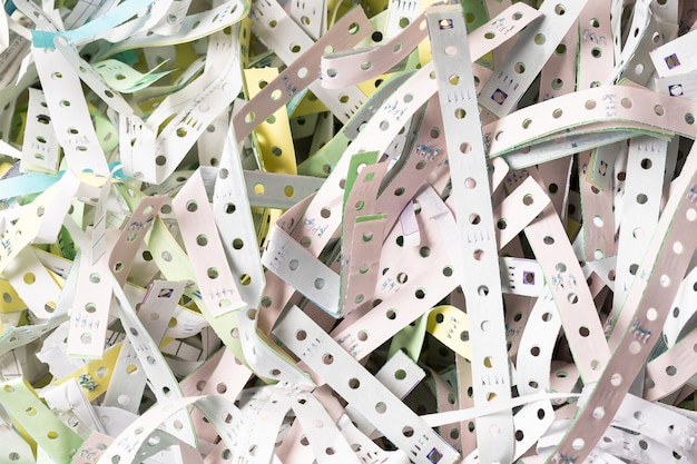 The discarded paper edges from fanfold continuous stationery, recycle or reuse for shockproof material