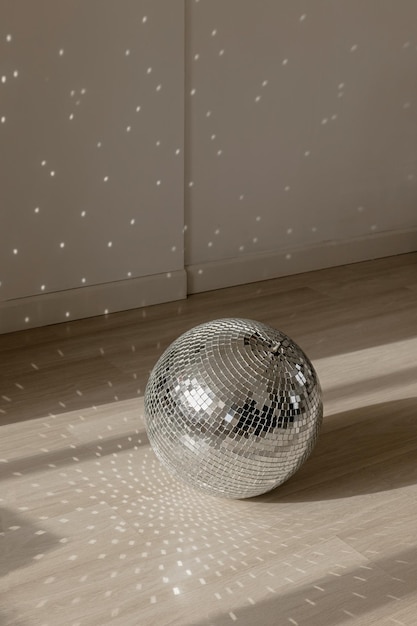 Disco ball in the sun in the interior