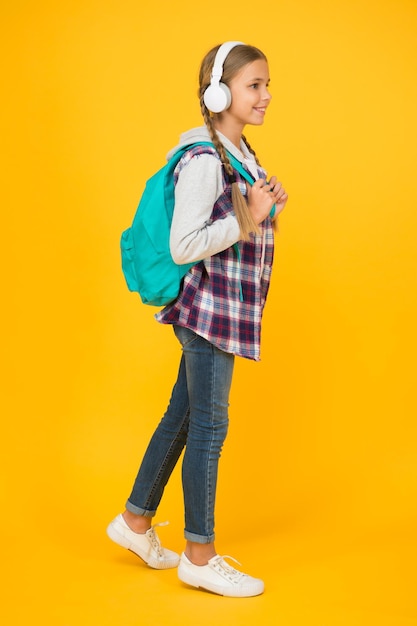 Discover the Possibilities hipster girl care backpack schoolgirl school bag autumn kid fashion child listen music headset childhood education and development happy childrens day audio book