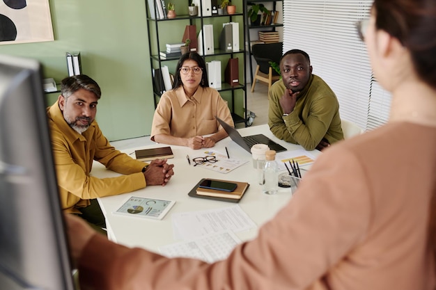 Photo discussing business strategy during team meeting