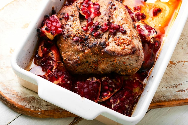 A dish of pomegranate roast with pomegranate sauce