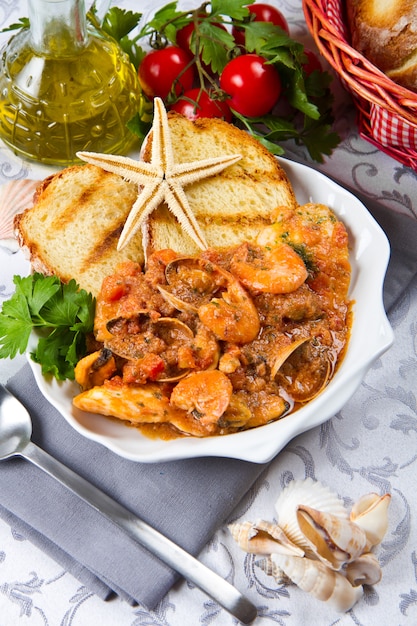 dish with fishsoup and bread