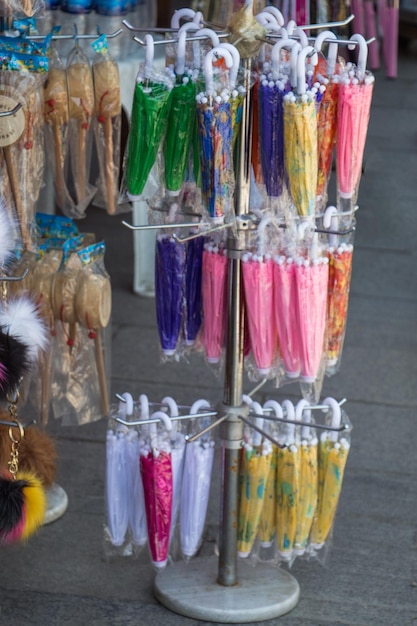 A display of colorful tassels for sale