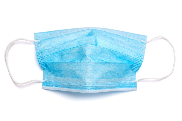 Disposable blue medical face mask isolated on white background with clipping path