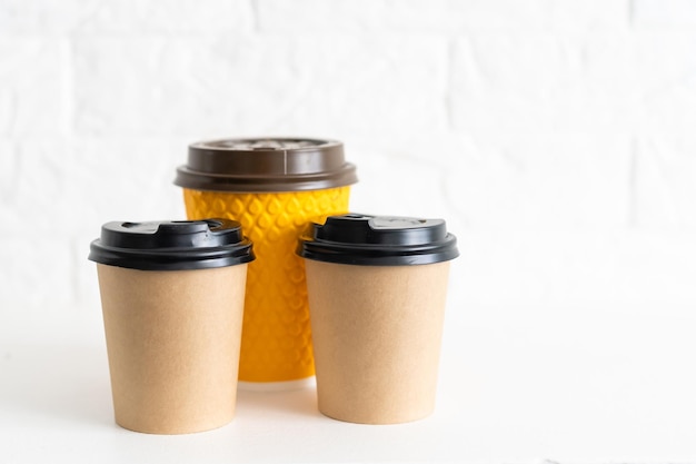 Disposable paper coffee cup on white background with clipping path. Collection