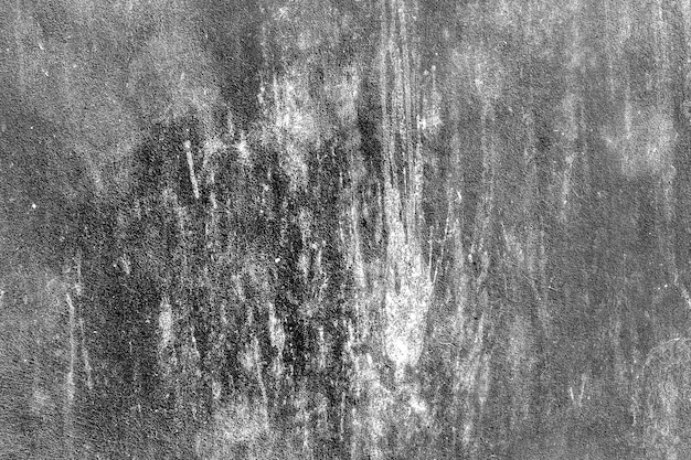 Distressed dark gray grunge texture on concrete plaster surface for background