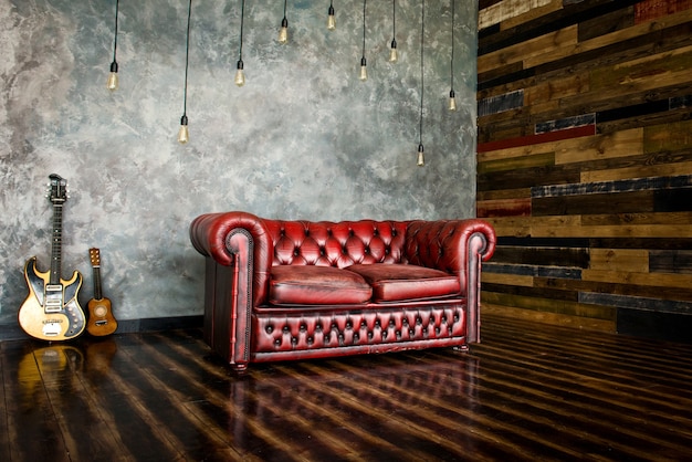 The divan is an honor of burgundy color in the interior.