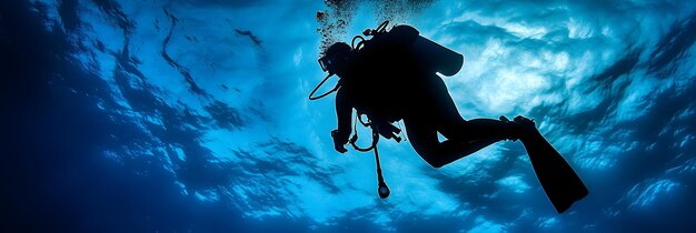 Photo diver performing middive off platform