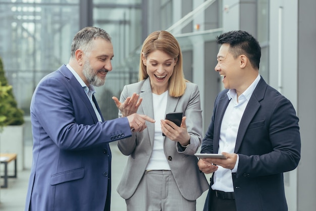 Diverse business team male and female business people together outside office group of successful