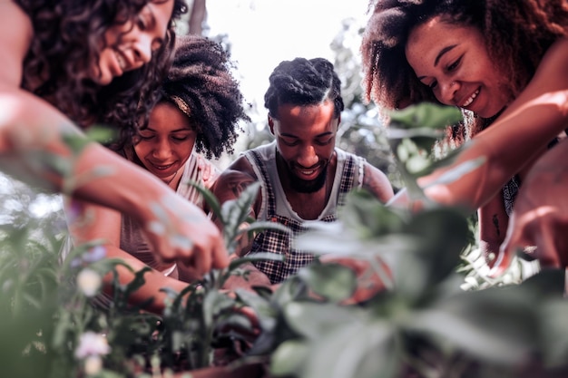 diverse group of neighbors collaborating on a community garden project