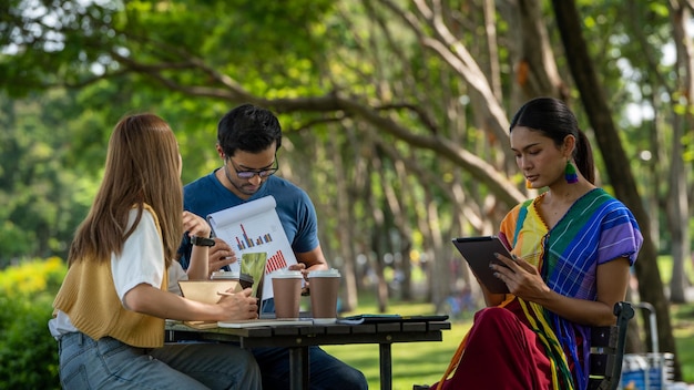 Diverse LGBTQ Partnership culture Business Partner Working support together at Park Business young Team Discuss at the outdoor Business Colleagues Outside Office A group of Friends students