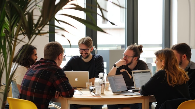 Photo diverse people working together by using laptop while sitting at table aig53