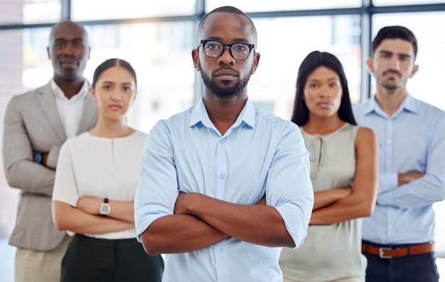 Diversity serious and corporate team portrait with arms crossed in expert legal office workspace Multicultural and professional lawyer company with assertive and smart people standing together