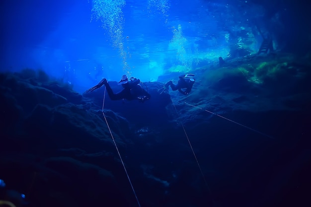 diving in the cenotes, mexico, dangerous caves diving on the yucatan, dark cavern landscape underwater