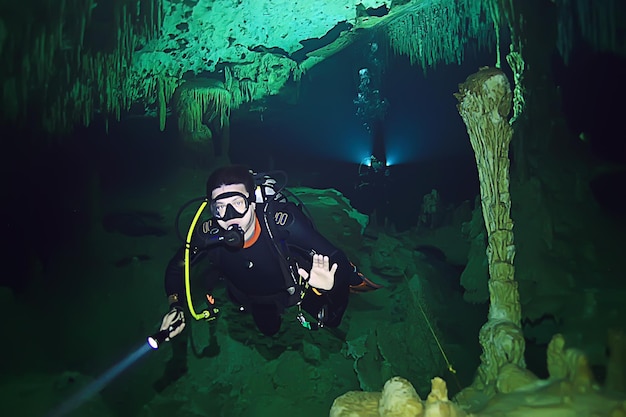 diving in the cenotes, mexico, dangerous caves diving on the yucatan, dark cavern landscape underwater