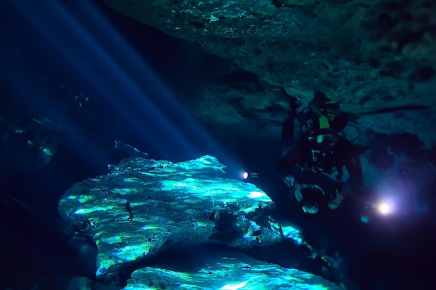 diving in the cenotes, mexico, dangerous caves diving on the yucatan, dark cavern landscape underwater