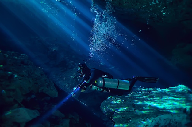 diving in the cenotes, mexico, dangerous caves diving on the yucatan, dark cavern landscape underwater