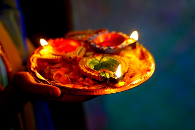 Diwali lamp and marigold petals