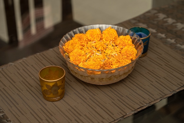 Diya with yellow flower decoration