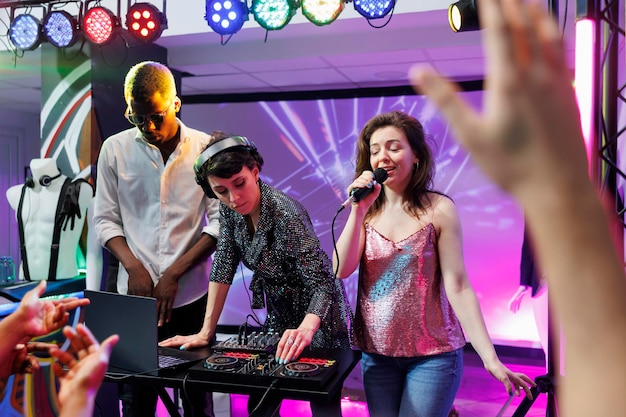 Dj and singer performing in nightclub