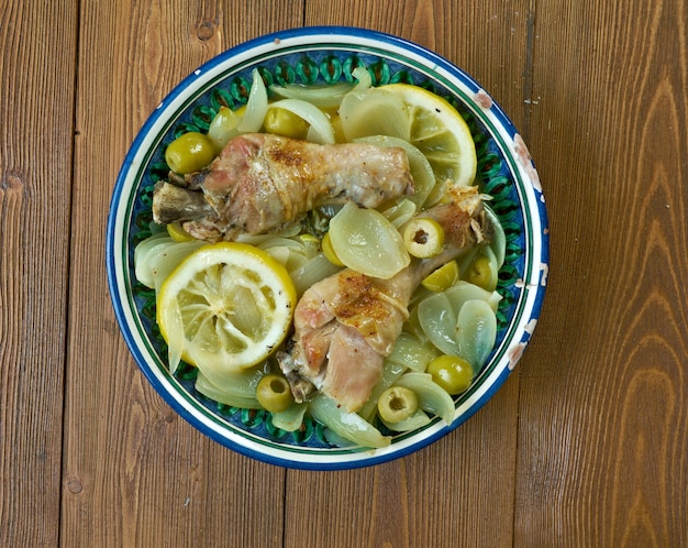 Djej bil Besla - algerian dish  chicken with saffron and olives