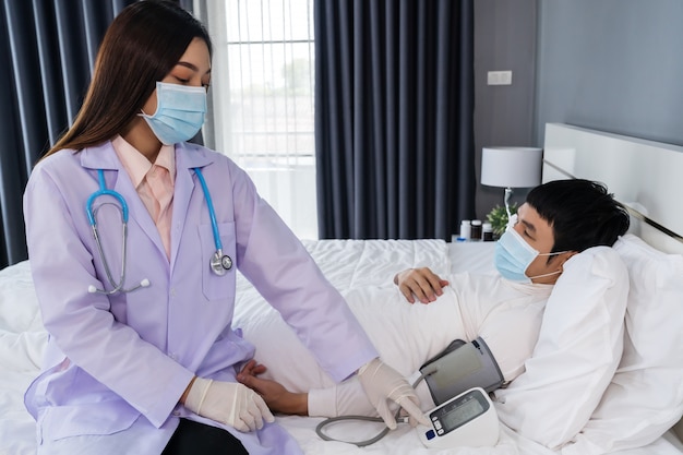 Doctor checking on the patient in a hospital room