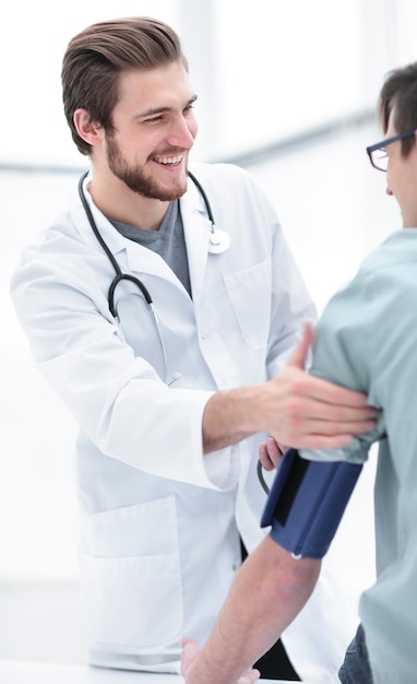 Doctor doing a routine inspection of the patient