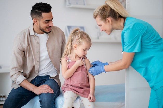 Doctor doing their work in pediatrics office