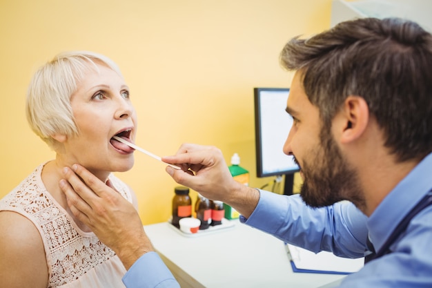 Doctor examining a patient