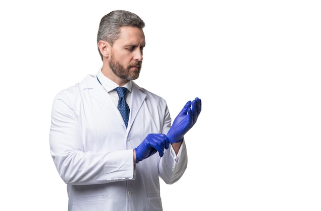 Doctor get ready and wearing protecting gloves sterile protective gloves surgeon wear gloves