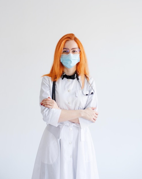 A doctor girl with red hair on a white background