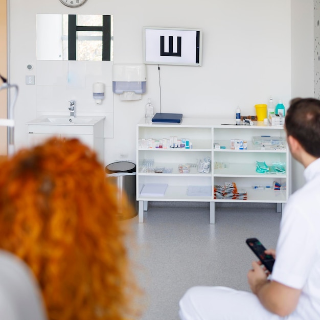 A doctor and his patient conducting an eyesight test