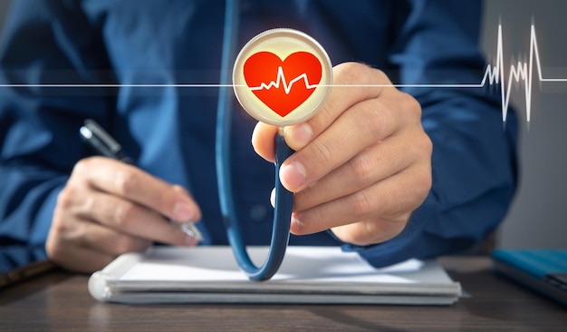 Doctor holding stethoscope with a heartbeat