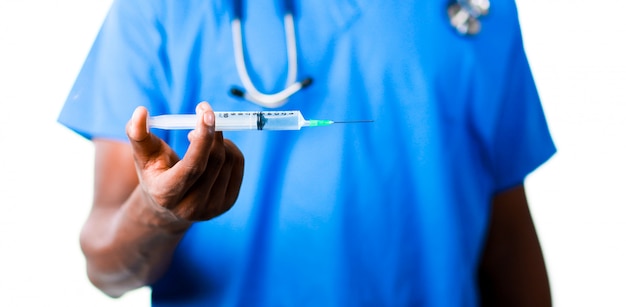 Doctor holding a syringe