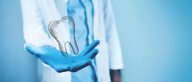 Doctor holding a tooth icon in his hand