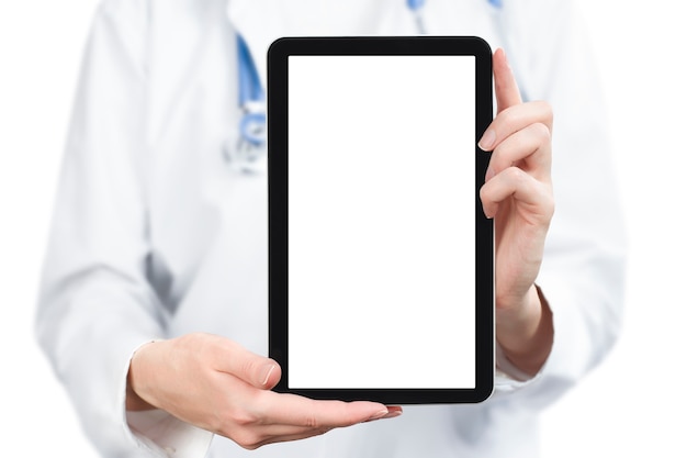 The doctor holds a digital tablet with a copy space in his hands. isolated on white surface